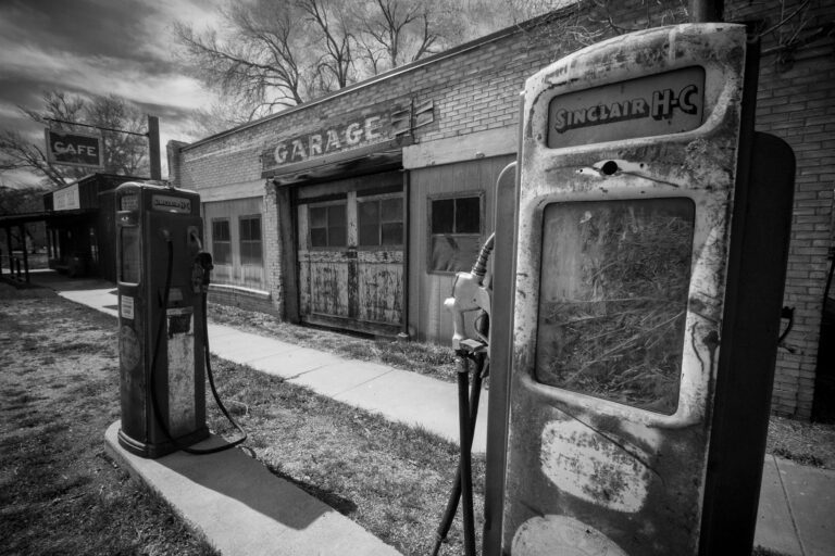 This photo of an abandoned gas station, taken in harsh midday light, was rather mundane (left).Working with the B&W mixer in Adobe Bridge allowed me to darken the sky and intensify details in the old garage and weathered pumps.