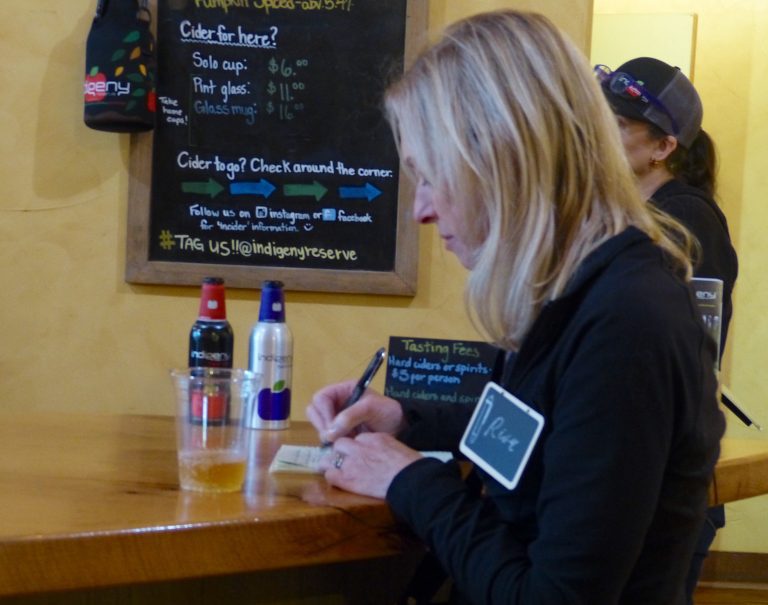 Ever diligent, Risa Wyatt takes notes at Indigeny cidery.