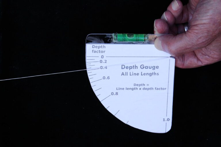 The back side of the gauge measures tolling depth for all lengths of line.