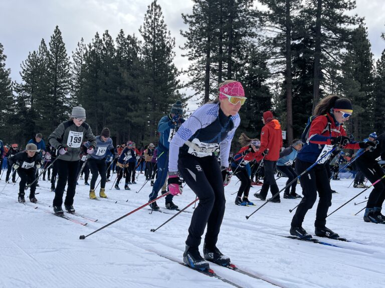 Competitors begin The Great Ski Race beside Lake Tahoe.