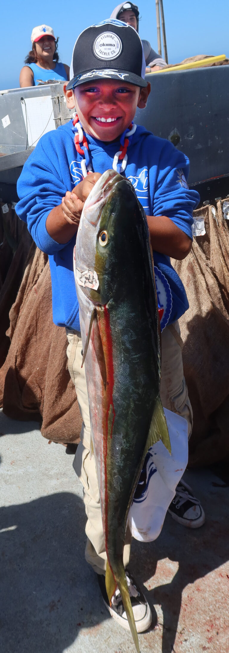 HE SURE WAS ABLE. 8-year-old angler, Able, busted out the largest fish at 18.8-pounds on Speedtwin. The larger model yellowtail gave the young angler the boat jackpot and a new rod.